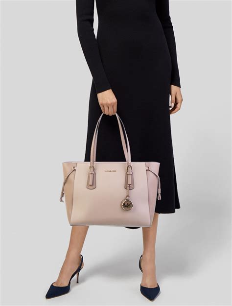 michael michael kors voyager medium crossgrain leather tote|michael kors voyager tote merlot.